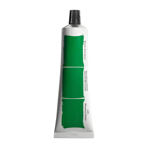 Haruharu Wonder Black Bamboo Nourishing Calming Hand & Nail Cream in a sleek green tube for soothing hand care.