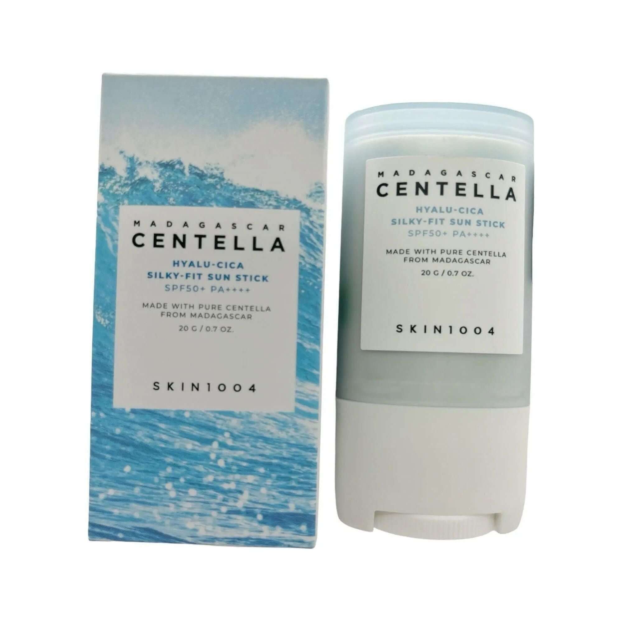 SKIN1004 - Madagascar Centella Hyalu-Cica Silky-Fit Sun Stick SPF50+ with packaging against a blue background.